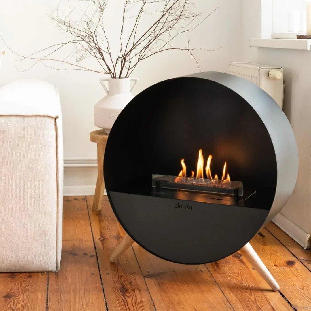 Planika Bubble freestanding fireplace in a living room